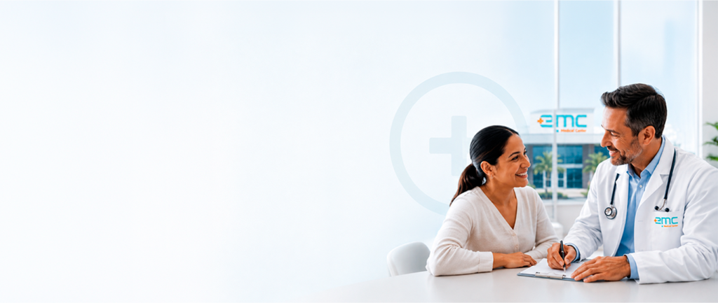An EMC physician talking with a patient in the exam room